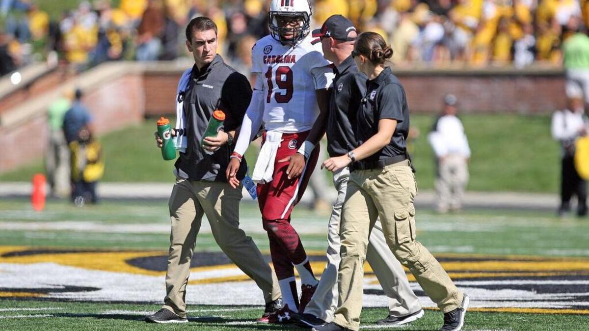 
South Carolina quarterback Lorenzo Nunez leaves the field after being shaken up against Missouri on Saturday at Faurot Field in Columbia, Mo.
