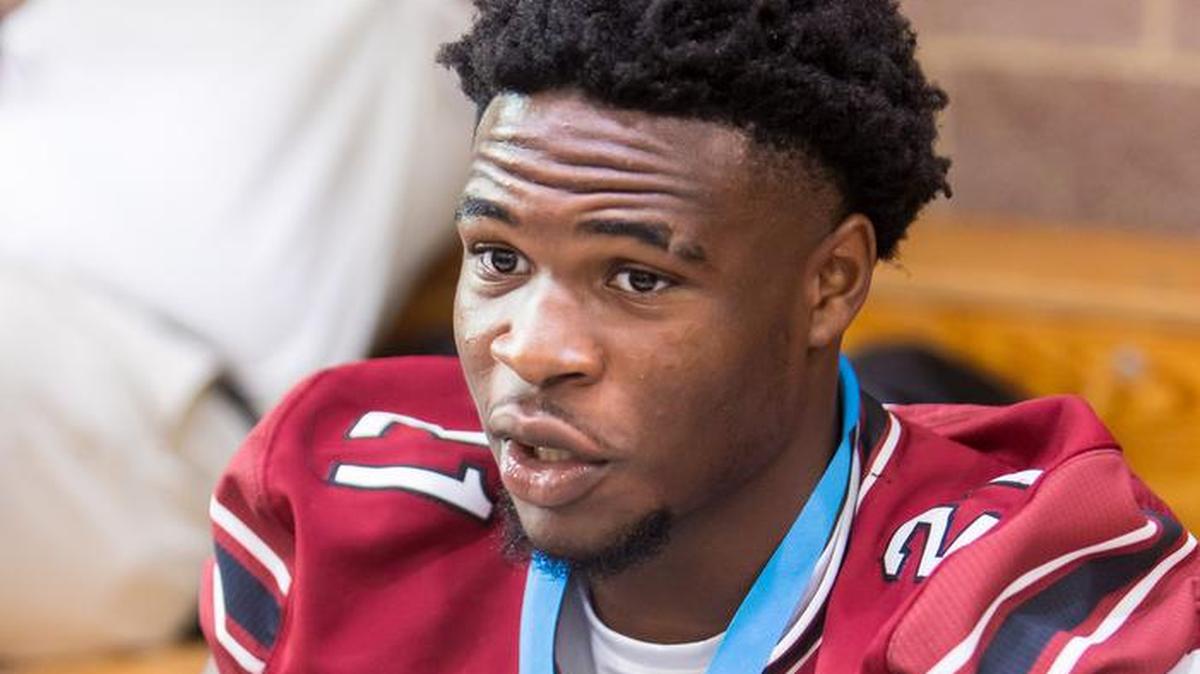 South Carolina Gamecocks defensive back Nick Emmanwori (21) signs autographs as part of Pigskin Poets at the Drew Wellness Center in Columbia, SC, on July 29, 2022. Members of the team took turns reading to a large group of children.