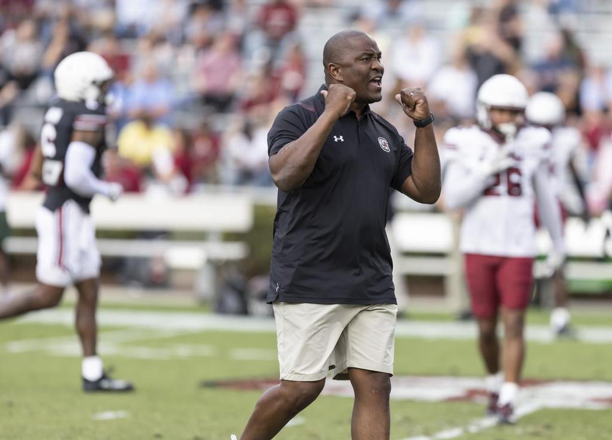 Gamecocks defensive coordinator Clayton White talks with players during the Gamecocks??? Spring Game held at Williams-Brice Stadium on Saturday, April 16, 2022.