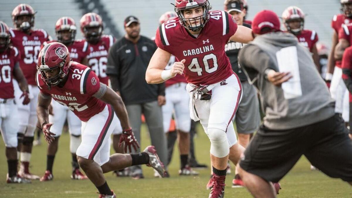 South Carolina tight end Jacob August participates in a drill during football practice Wednesday evening at Williams-Brice Stadium.