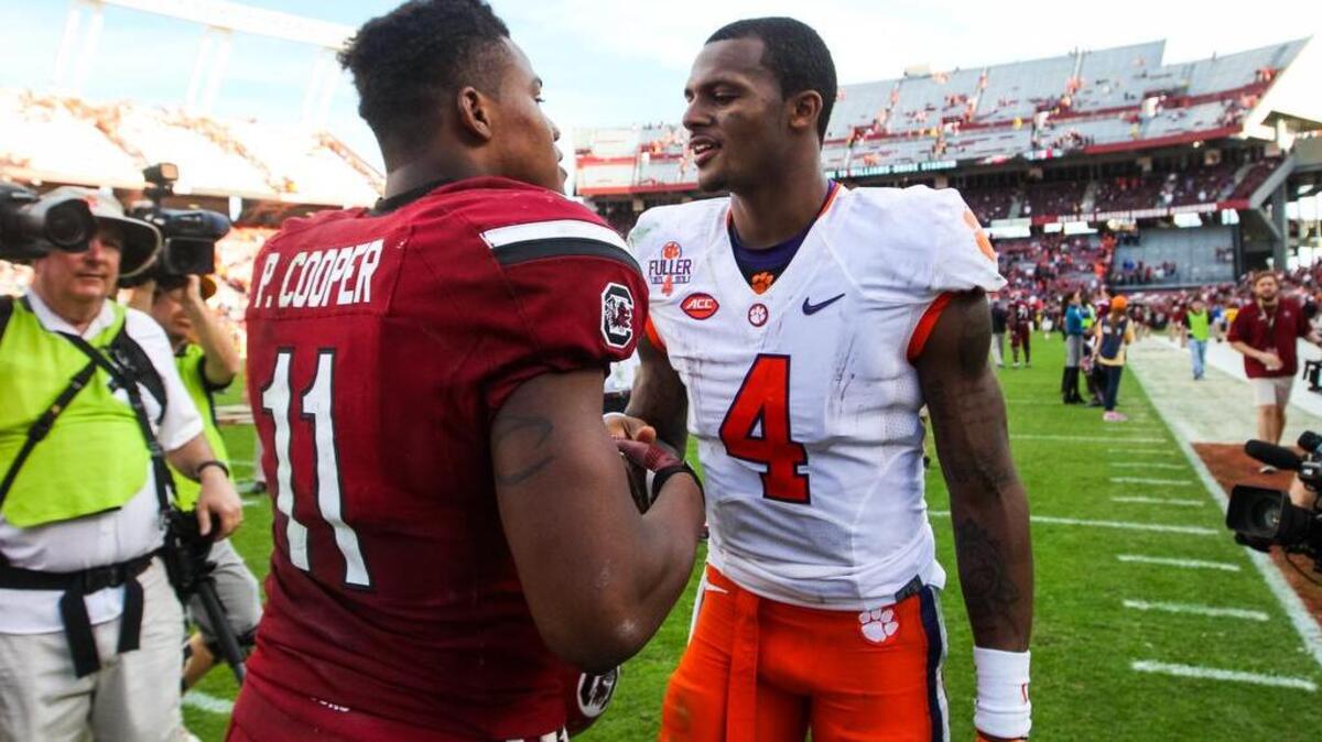 South Carolina wide receiver Pharaoh Cooper (11) congratulates Clemson quarterback Deshaun Watson (4)