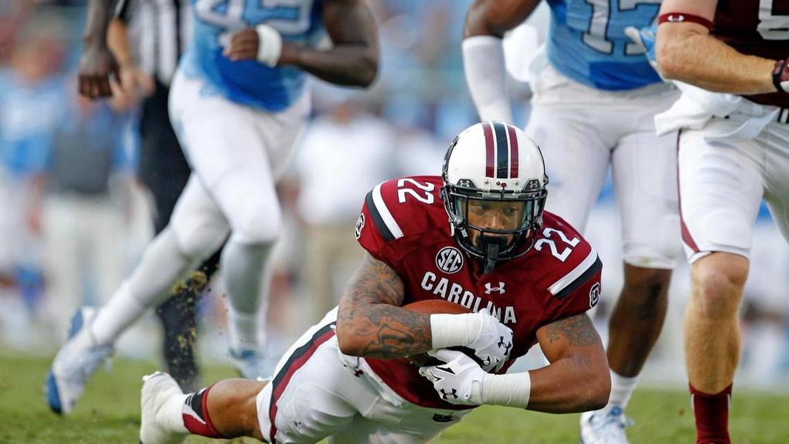 
USC running back Brandon Wilds (22) breaks free for a run in the first half of the Belk College Kickoff in Charlotte, NC, Thursday.
