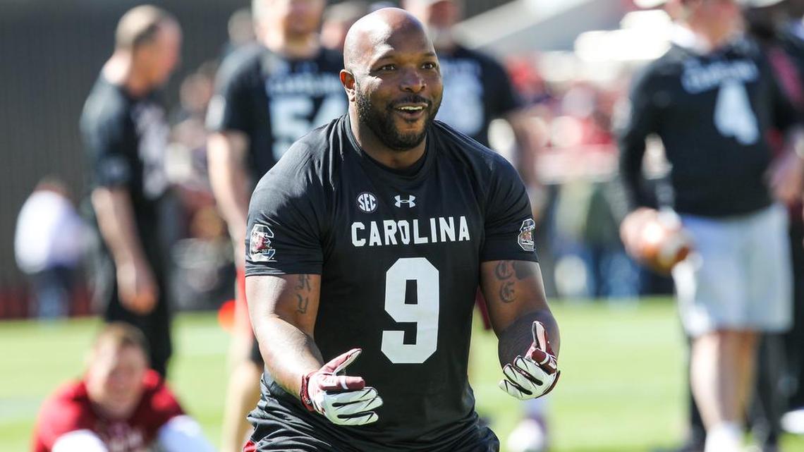 Corey Jenkins warms up before the South Carolina Alumni flag football game at Williams-Brice stadium.