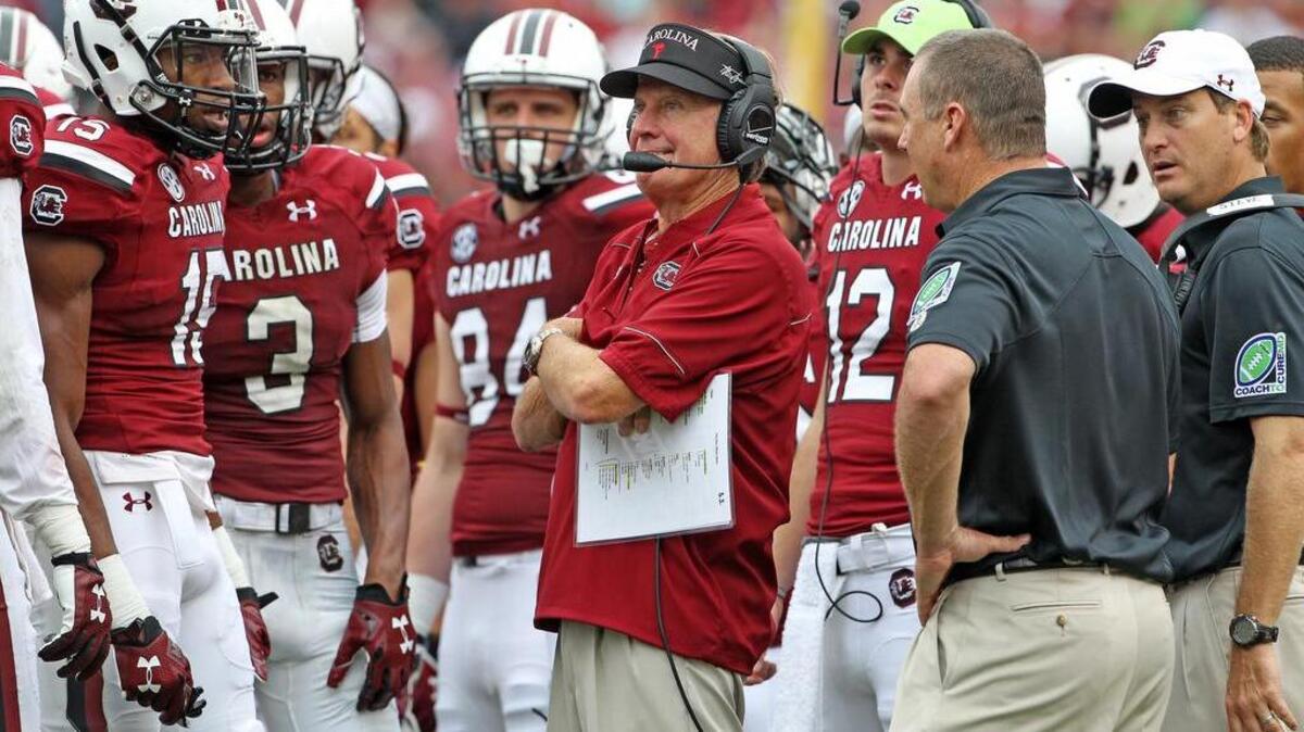 
USC head football coach Steve Spurrier looks at the clock as he gathers his team in the second half against UCF at Williams-Brice Stadium in Columbia, SC, Saturday, September 26, 2015. 
