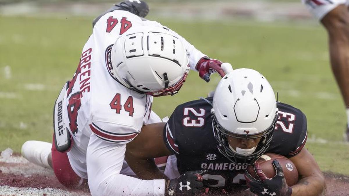 South Carolina Gamecocks running back Rashad Amos (23) gets tackled by Sherrod Greene during the Gamecocks??? Spring Game held at Williams-Brice Stadium on Saturday, April 16, 2022.