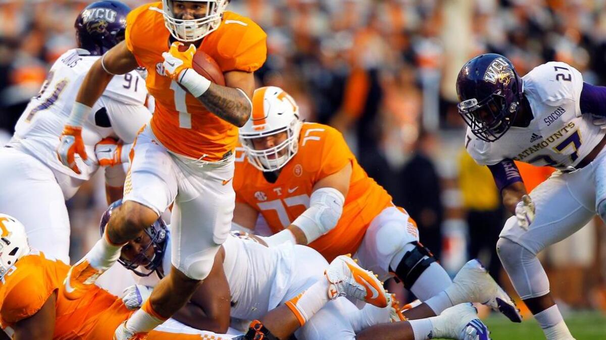 
Tennessee running back Jalen Hurd and the Volunteers will try to break a 10-game losing streak to Florida on Saturday.
