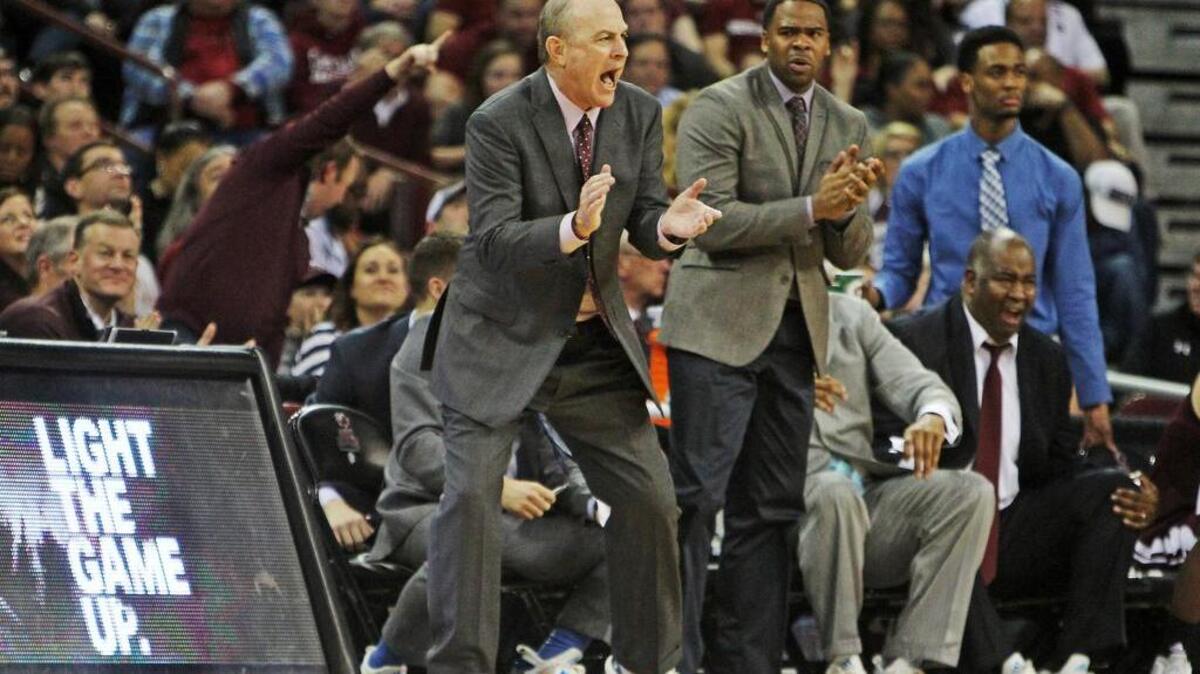 Mississippi State's Ben Howland cheers his players on in the second half against South Carolina on Tuesday.
