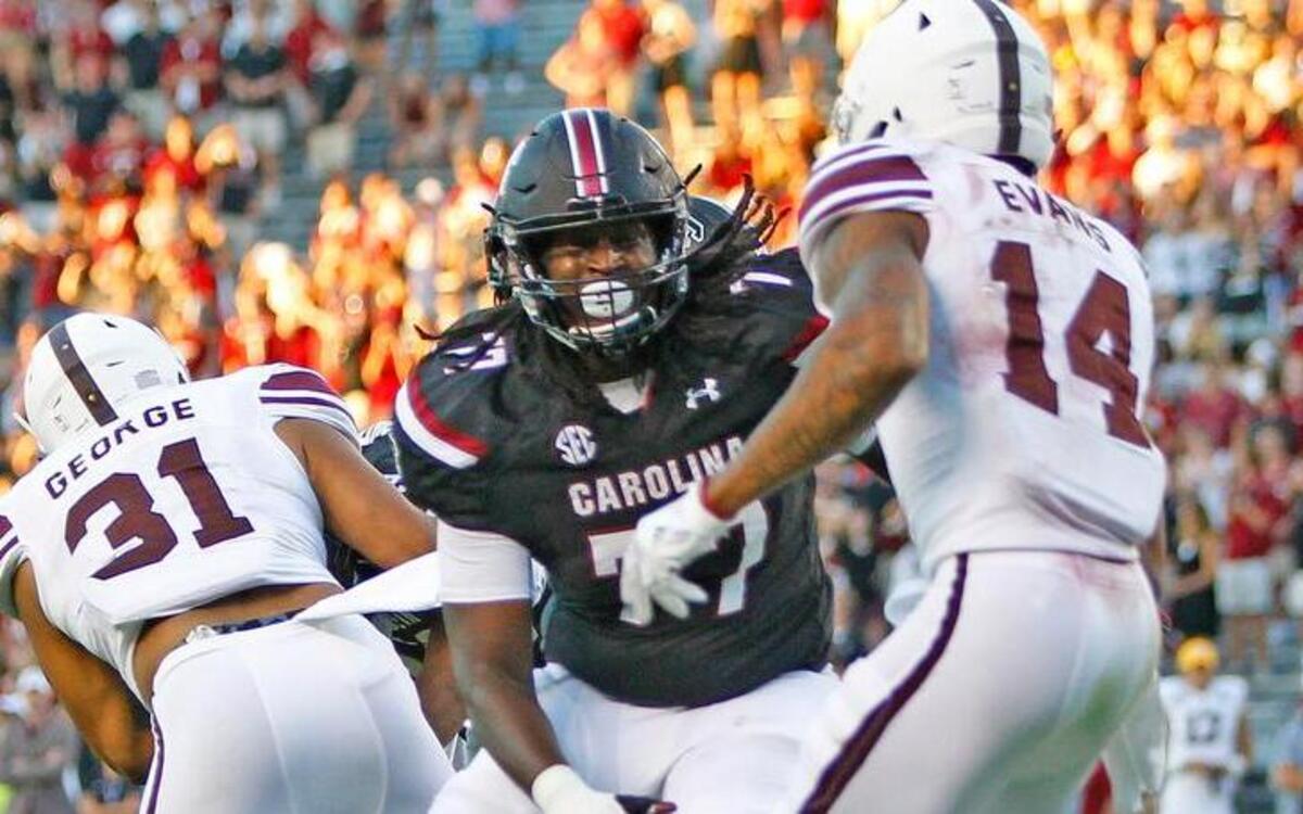 South Carolina offensive lineman Malik Young (77) blocks Texas A&M Aggies defensive back Justin Evans (14) last weekend.