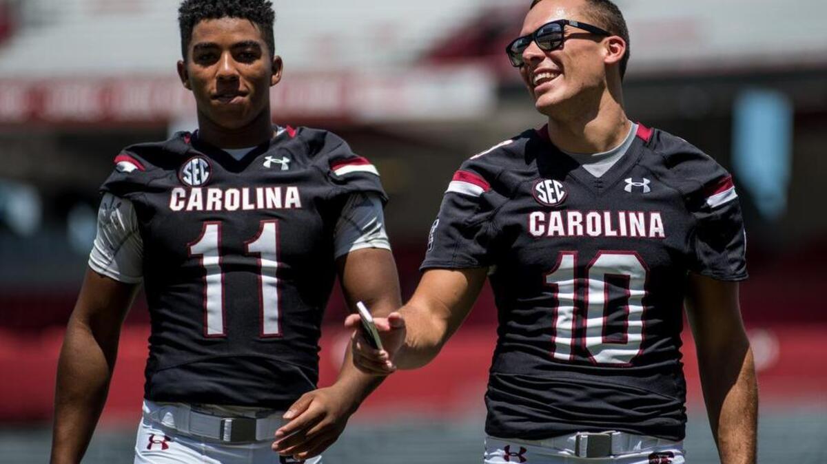 South Carolina quarterbacks Perry Orth (11) and Brandon McIlwain (11)