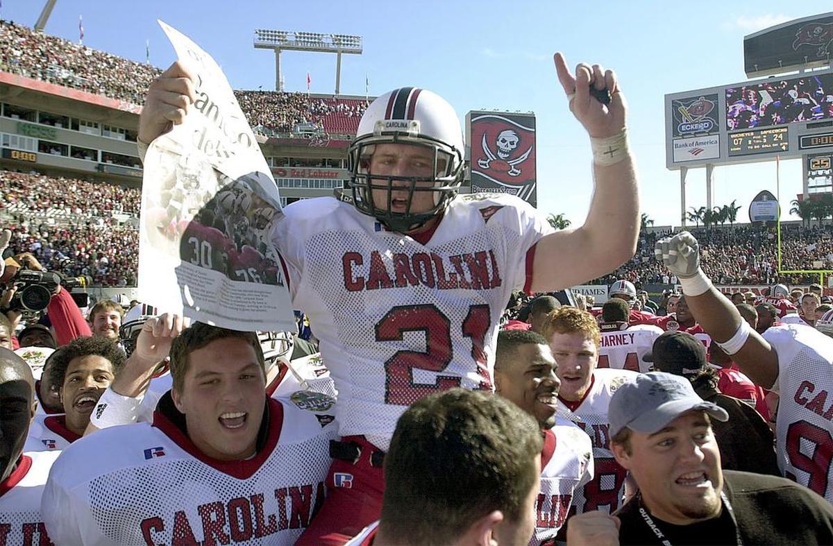 USC’s Ryan Brewer is carried by his teammates after helping the Gamecocks win the 2001 Outback Bowl at Raymond James Stadium in Tampa, Fla. on New Years Day. Brewer was named the MVP of the game in his effort to help USC beat Ohio State 24-7.