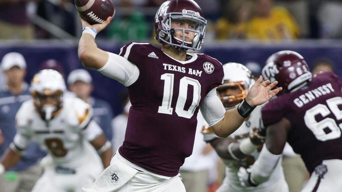 
Texas A&M Aggies quarterback Kyle Allen (10) throws a touchdown reception Saturday during the fourth quarter against Arizona State.

