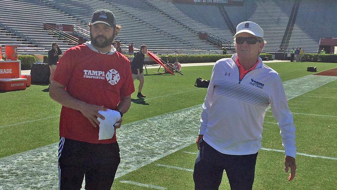 Former South Carolina football coach Steve Spurrier visits with his former quarterback Stephen Garcia at Williams-Brice Stadium in 2018.