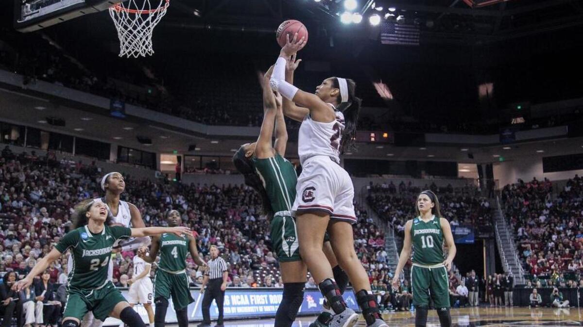 South Carolina's A'ja Wilson (22) shoots over Jacksonville's forward Kimberly Dawkins (13) during the first round of the NCAA Division 1 basketball championship at Colonial Life Arena.