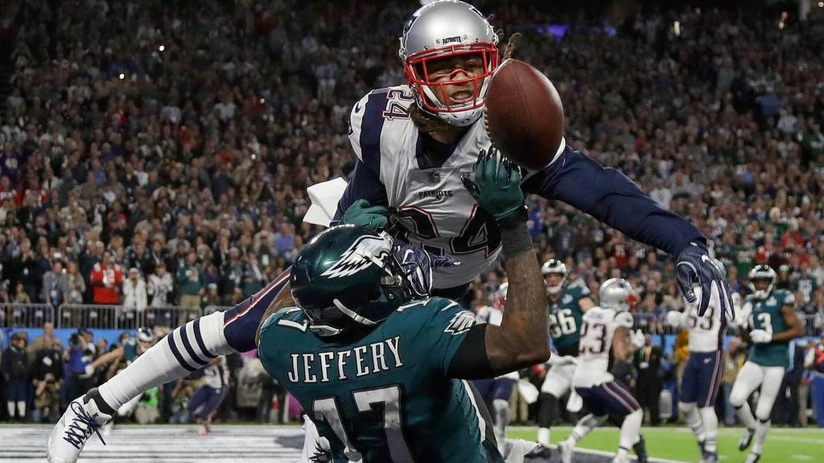 New England Patriots’ Stephon Gilmore, top, intercepted his second pass of the season during his team’s win over the New York Jets.