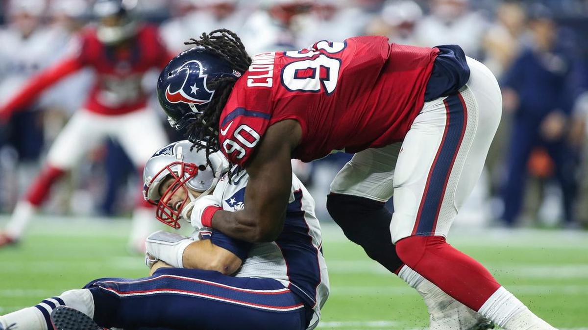 Houston Texans outside linebacker Jadeveon Clowney (90) sacks New England Patriots quarterback Tom Brady (12)