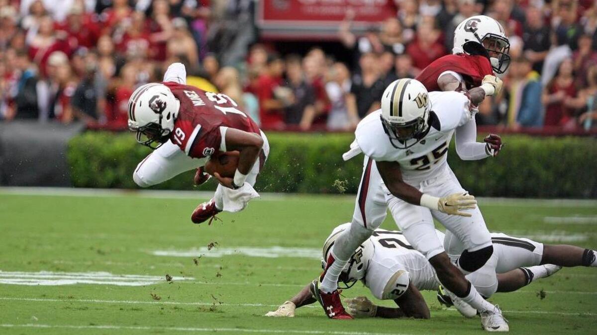 
South Carolina quarterback Lorenzo Nunez gains yardage against UCF on Saturday at Williams-Brice Stadium.
