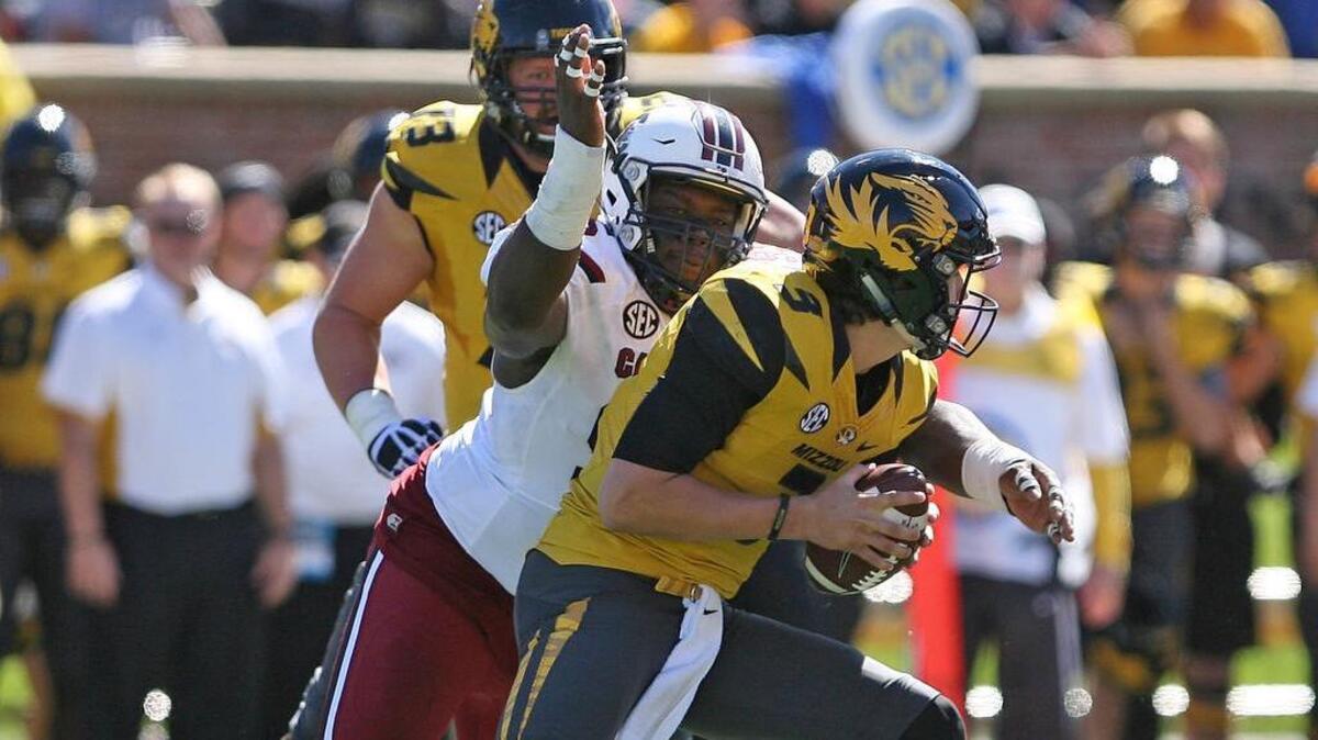 South Carolina's Dante Sawyer sacks Missouri quarterback Drew Lock last season.