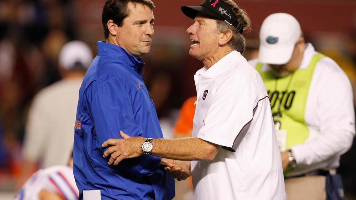 New South Carolina head coach Will Muschamp and Steve Spurrier, the man he’d eventually follow, chat in 2013.