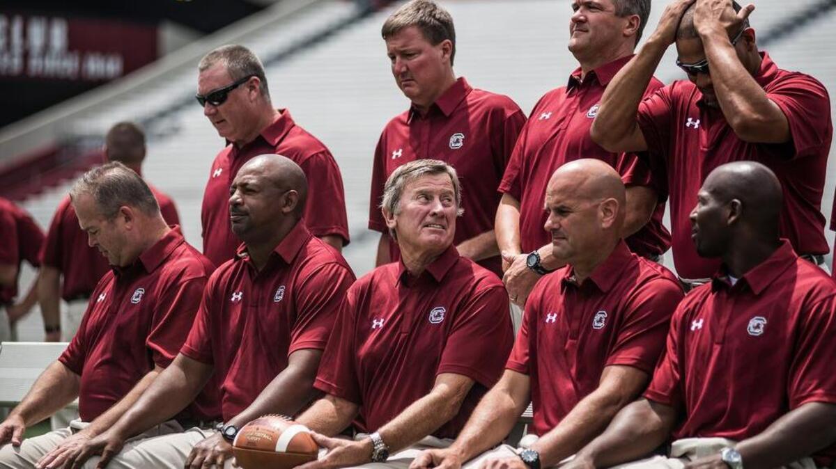 
Steve Spurrier and his coaching staff at media day Sunday.
