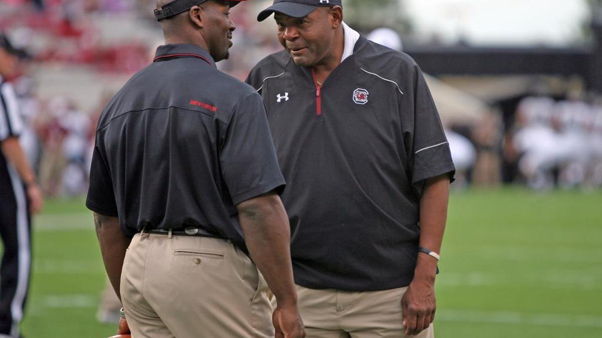 Former South Carolina equipment manager Chris Matlock (right) will remain on staff at USC.