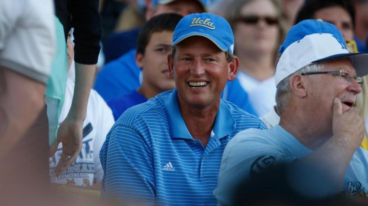 
Rick Neuheisel 
