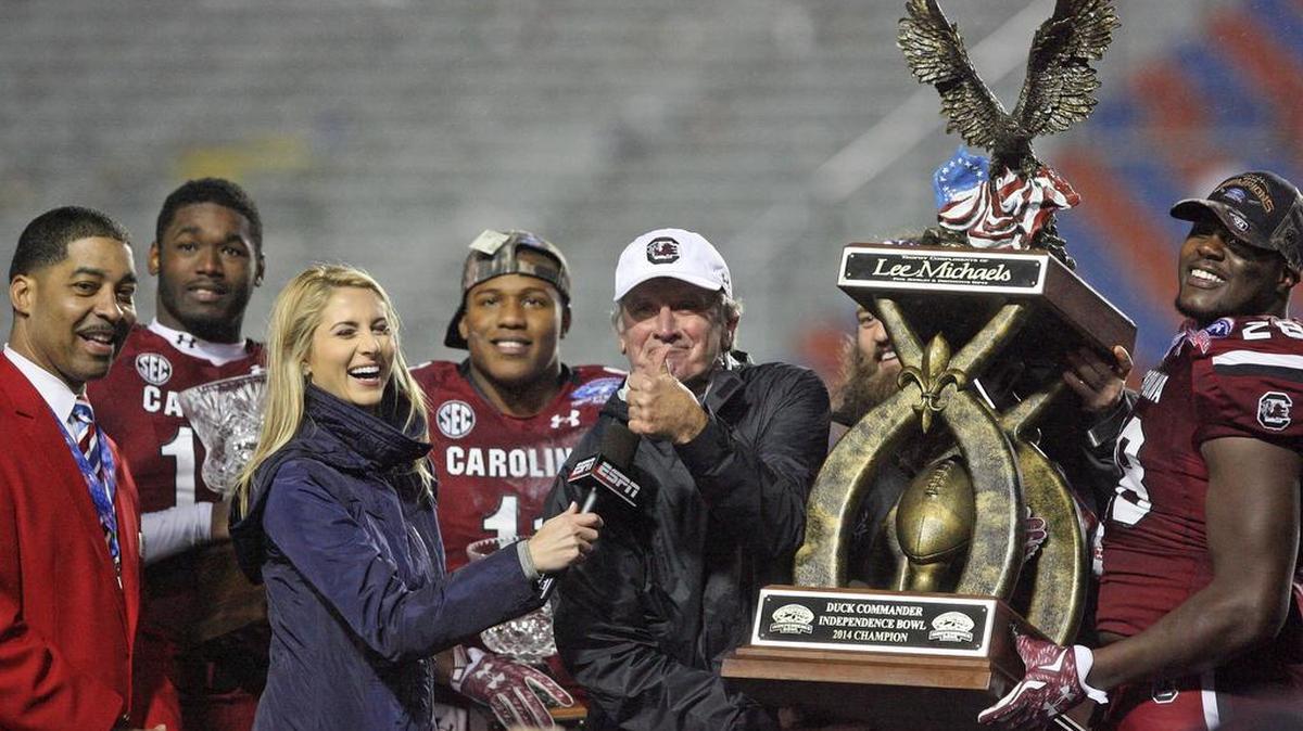 Coach Steve Spurrier and USC players celebrate the Gamecocks’ last bowl game -- a victory against Miami in the 2014 Duck Commander Independence Bowl.