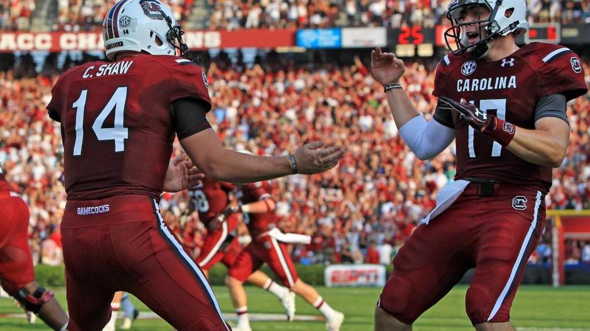 South Carolina quarterback Connor Shaw (14) and Dylan Thompson (17) in their college days