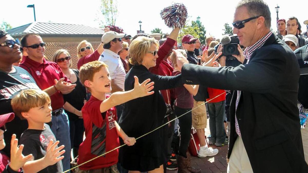 
New interim head coach Shawn Elliott greets fans before the game against Vanderbilt at Williams-Brice Stadium.
