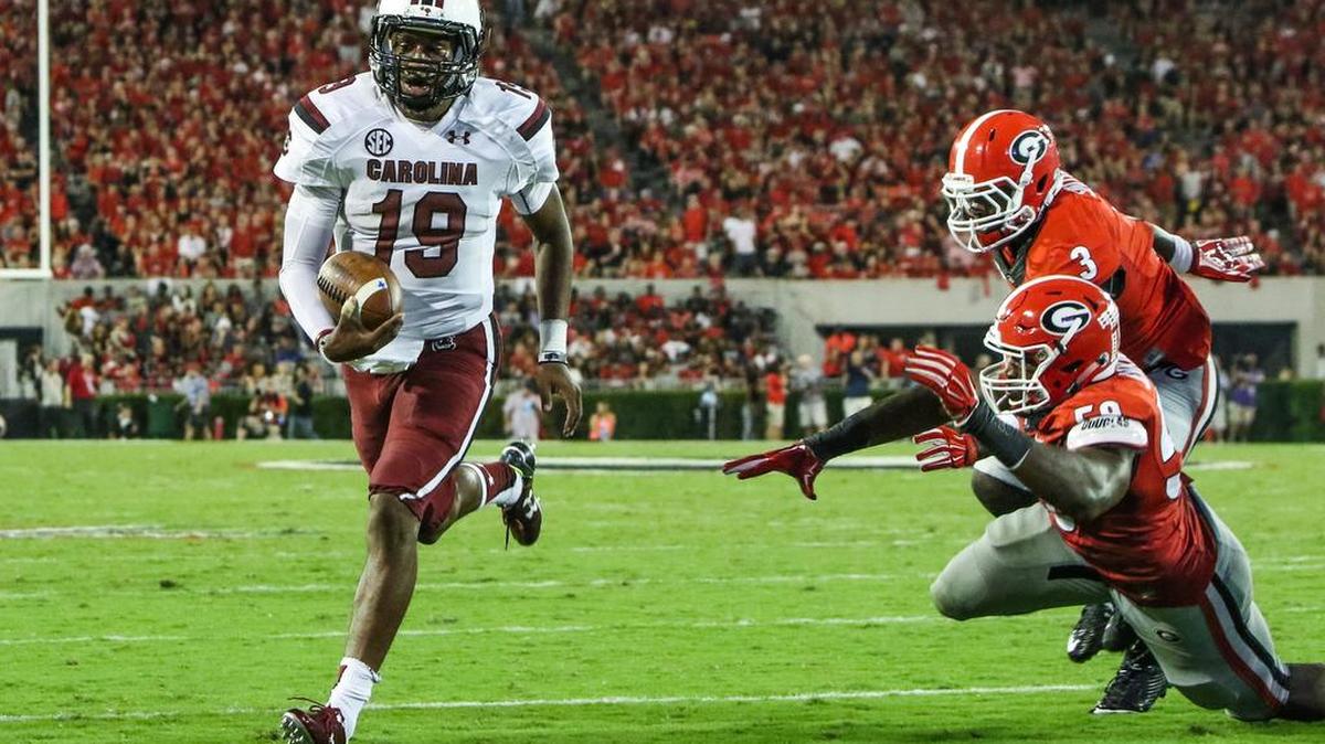 
South Carolina quarterback Lorenzo Nunez (19) scores a touchdown during the second half Saturday against the Bulldogs at Sanford Stadium.
