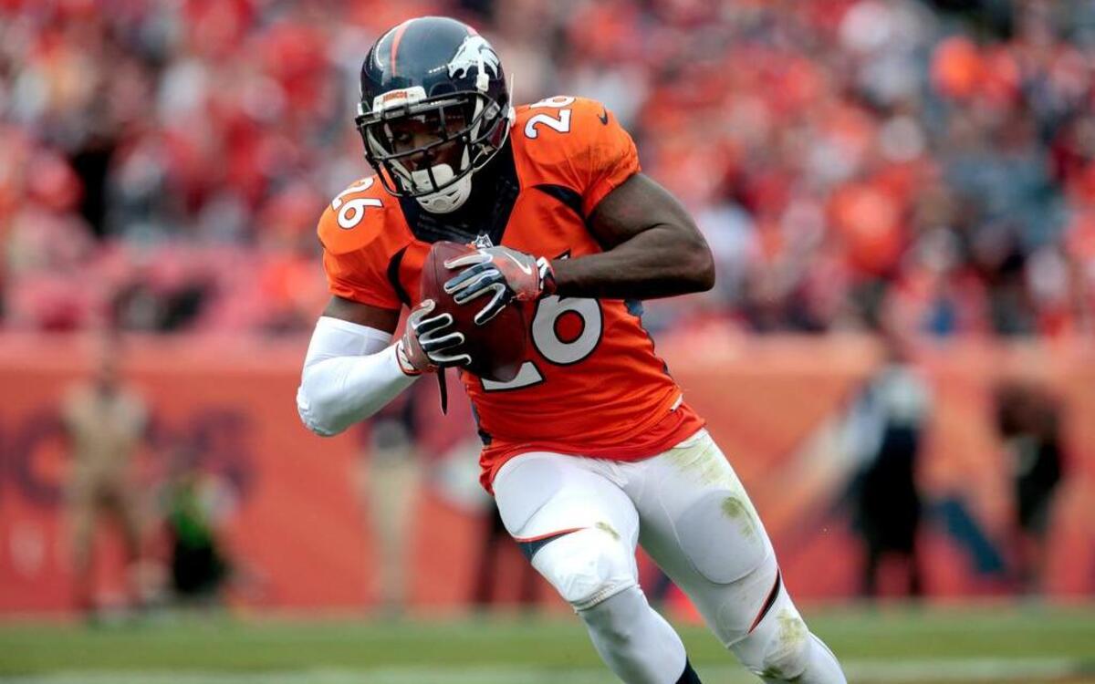 Denver free safety Darian Stewart intercepts a pass against San Diego.