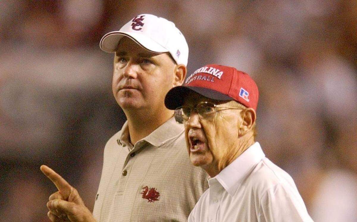 Skip Holtz and Lou Holtz during their time at USC