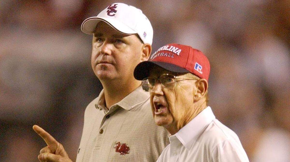Skip Holtz and Lou Holtz during their time at USC