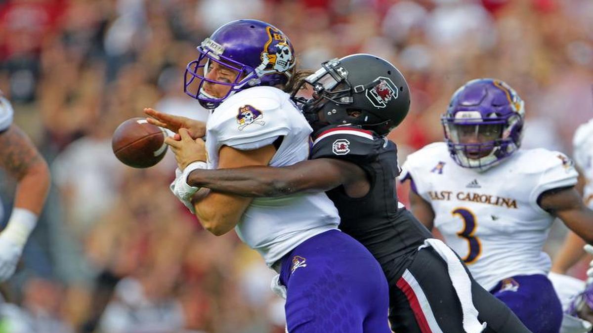 South Carolina Gamecocks defensive back Chris Lammons (3) causes East Carolina Pirates quarterback Philip Nelson (9) to fumble on Saturday.