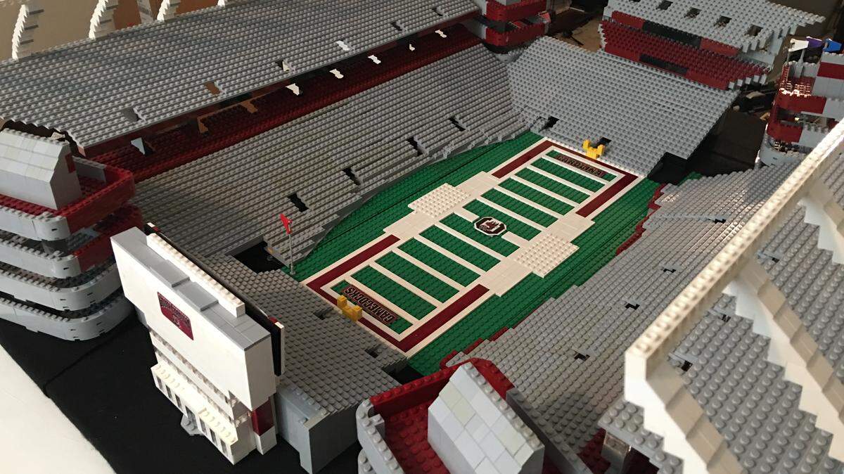 Charleston native , Gamecock fan David Robinson and his son. David Jr., recently finished a Lego replica of Williams-Brice Stadium.