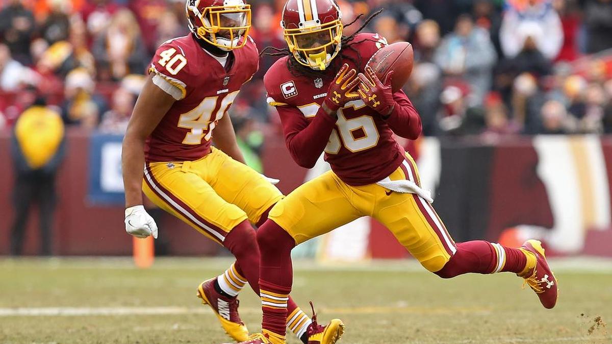 Washington Redskins free safety D.J. Swearinger (36) intercepts a pass by Denver Broncos quarterback Brock Osweiler (not pictured) in the second quarter at FedEx Field.