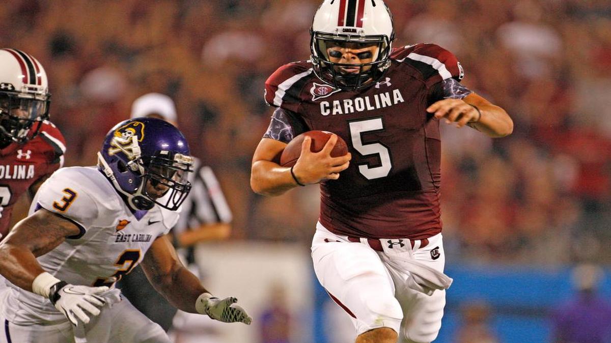 South Carolina quarterback Stephen Garcia (5) score on a second quarter run against East Carolina at Bank of America Stadium in Charlotte, NC, on Saturday, Sept. 3, 2011.