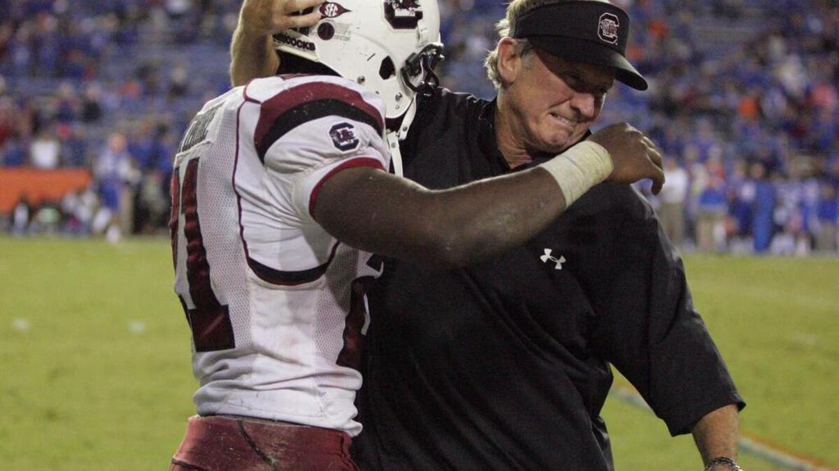 
From Nov. 13, 2015: Steve Spurrier celebrates with Marcus Lattimore as the Gamecocks defeat Florida to clinch the SEC East title.
