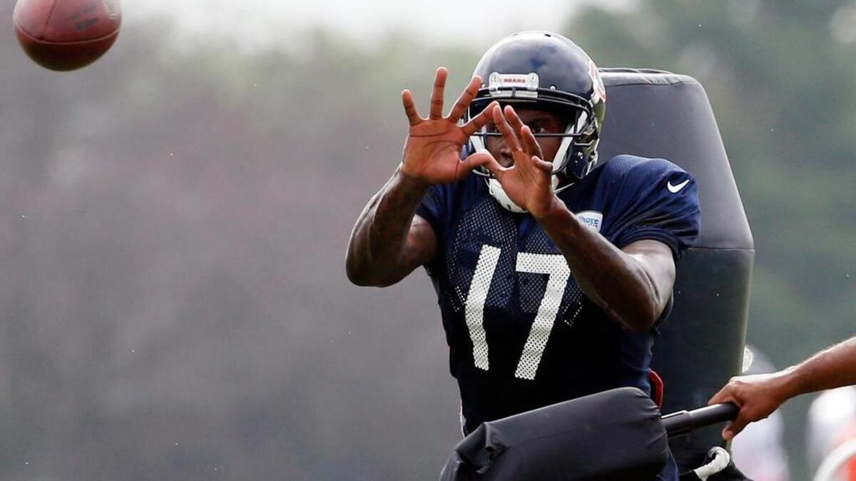 Chicago Bears wide receiver Alshon Jeffery catches a ball during practice at the NFL football team's training camp at Olivet Nazarene University, in Bourbonnais, Ill., in late July.