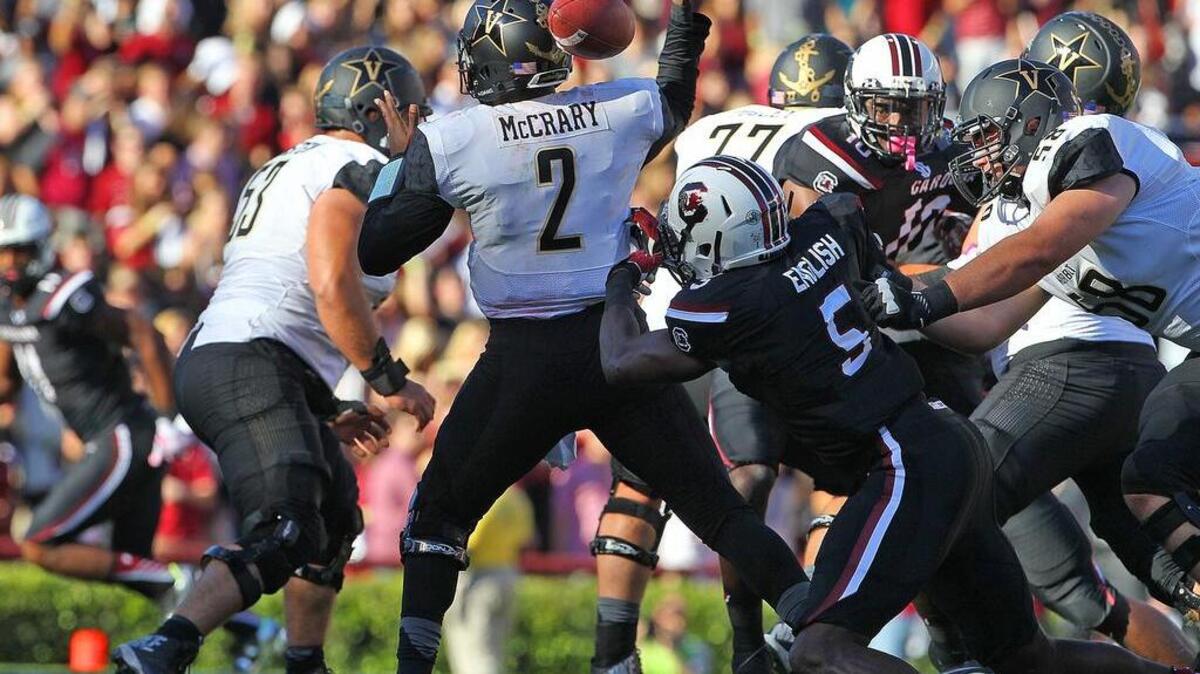 South Carolina Gamecocks defensive end Darius English (5) sacks Vanderbilt Commodores quarterback Johnny McCrary (2) causing a fumble.
