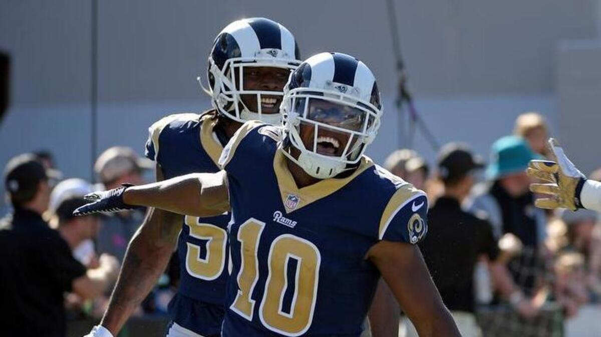Los Angeles Rams' Pharoh Cooper (10) celebrates a 103-yard touchdown kickoff return against the Jacksonville Jaguars during the first half of an NFL football game, Sunday, Oct. 15, 2017, in Jacksonville, Fla.