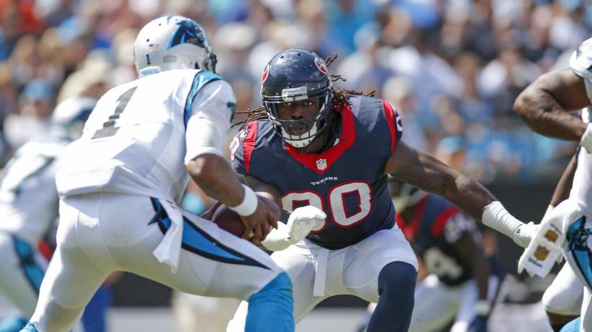 Houston Texans outside linebacker Jadeveon Clowney (90) works to put pressure on Carolina Panthers quarterback Cam Newton (1) in September. Clowney has been bothered this week by a lower back injury.