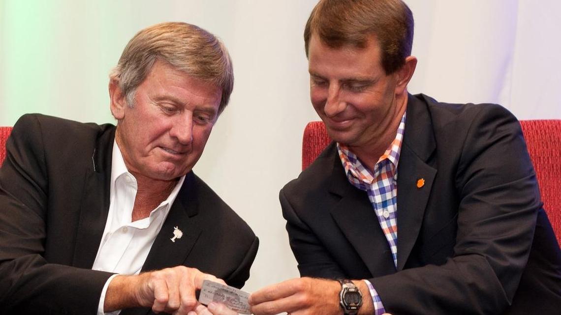 Coaches Steve Spurrier and Dabo Swinney at Fisher DeBerry's Coaches for Charity event. 7/30/14