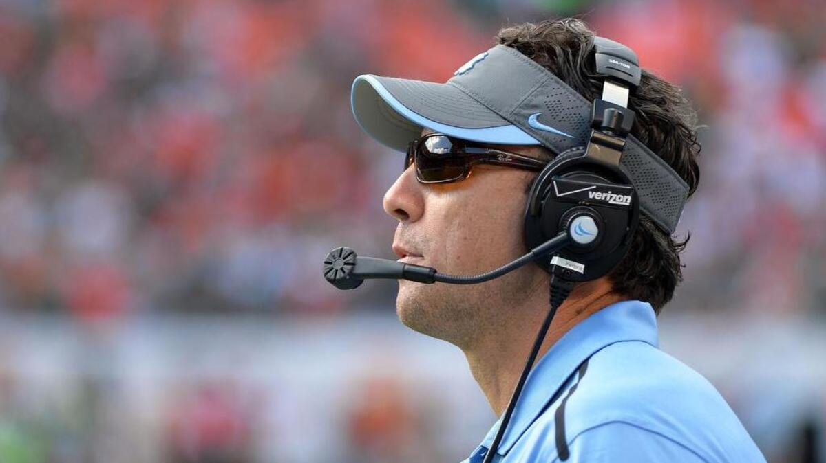 Nov 1, 2014; Miami Gardens, FL, USA; North Carolina Tar Heels head coach Larry Fedora looks on from the sideline during the first half against Miami Hurricanes at Sun Life Stadium. Mandatory Credit: Steve Mitchell-USA TODAY Sports