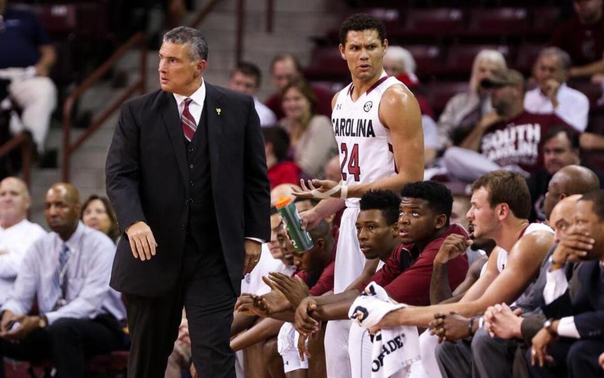 Coach Frank Martin and South Carolina's Michael Carrera (24)