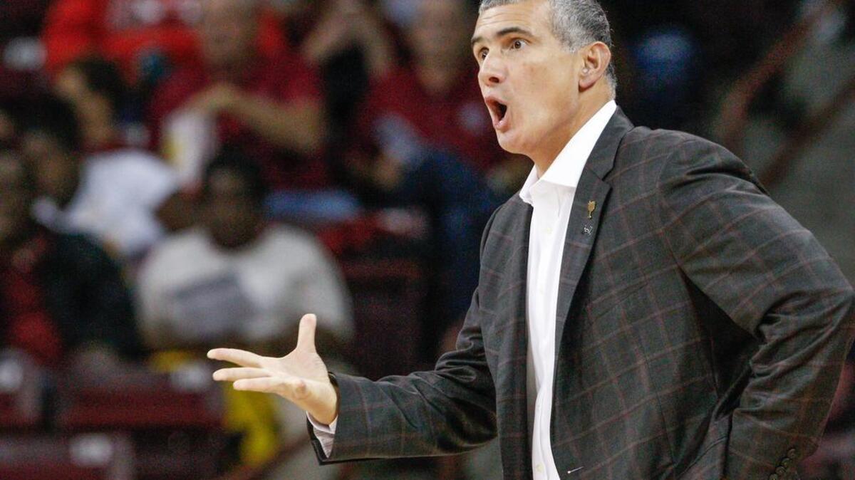 South Carolina coach Frank Martin talks to his team during the first half of action in an exhibition against Newberry.