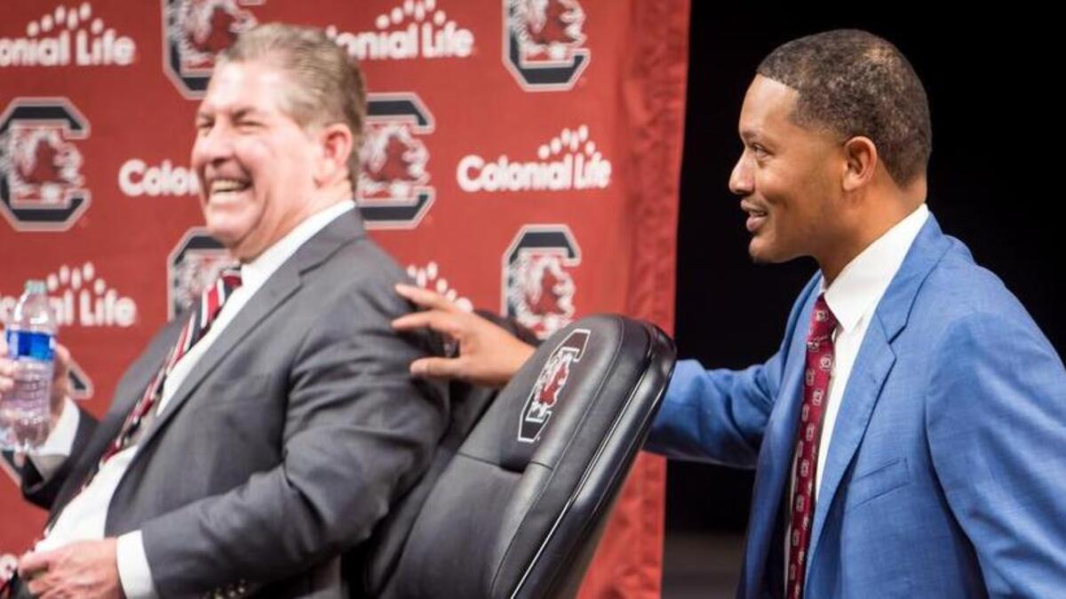 New South Carolina Gamecocks men’s basketball head coach Lamont Paris jokes with Athletics Director Ray Tanner during a press conference introducing Paris at Colonial Life Arena Thursday, March 24, 2022.