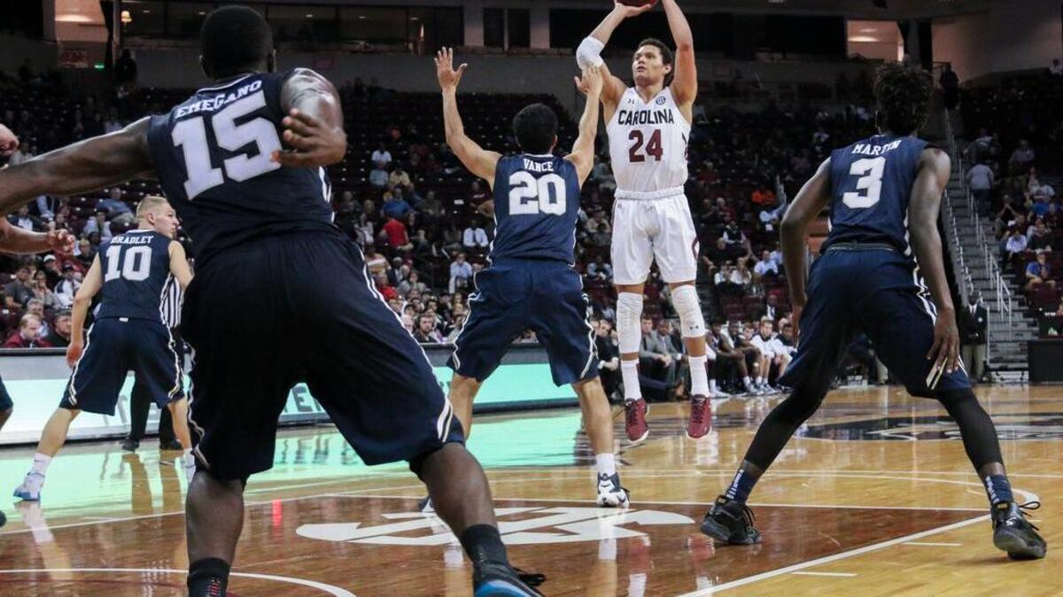 South Carolina's Michael Carrera (24) takes a shot while playing Oral Roberts