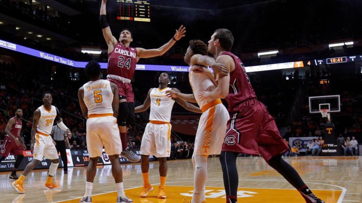 South Carolina forward Michael Carrera (24) shoots over Tennessee forward Admiral Schofield (5)
