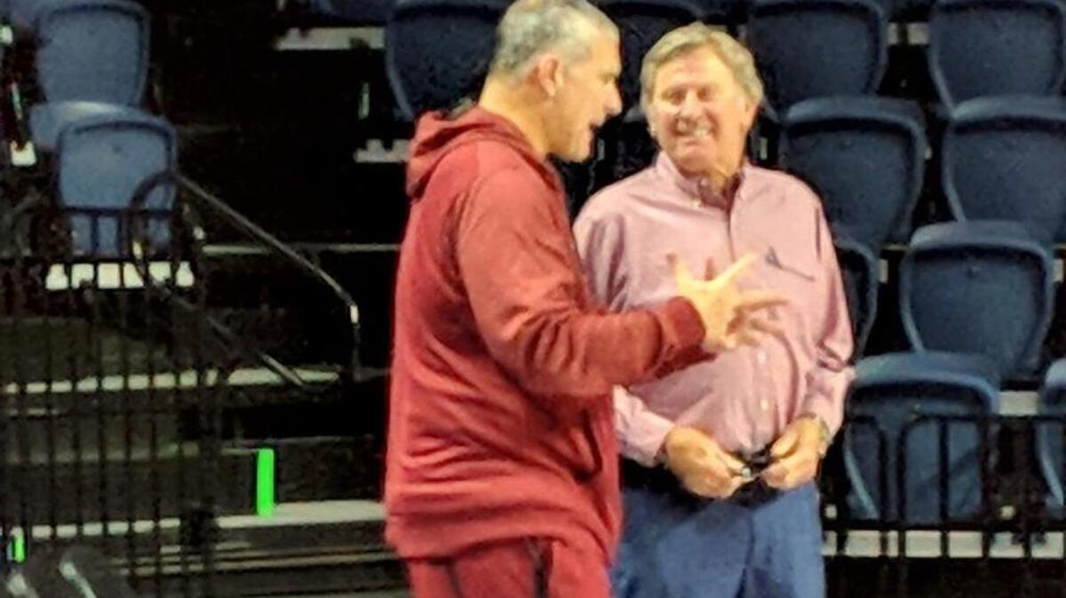 South Carolina men’s basketball coach Frank Martin, left, talks to former Gamecocks football coach Steve Spurrier prior to the game against the Florida Gators.