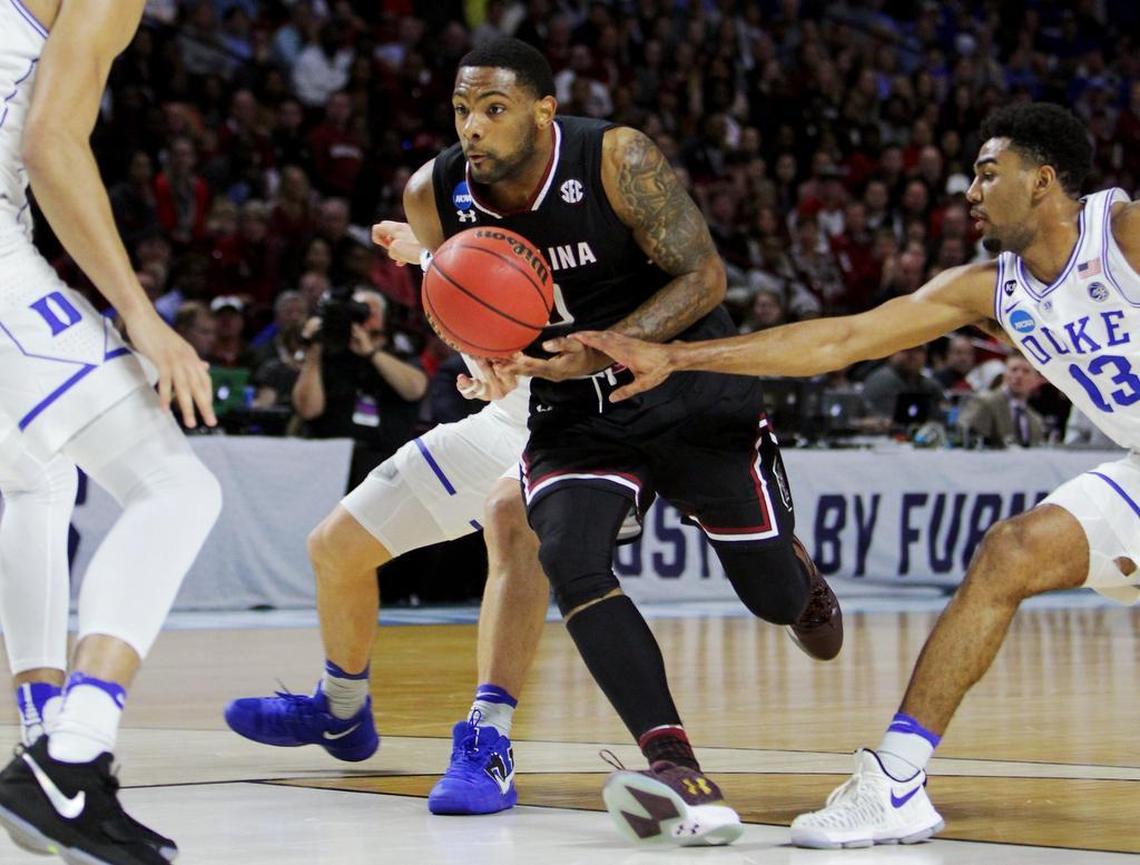 South Carolina guard Sindarius Thornwell (0) is fouled by Duke guard Grayson Allen (3) during their 2017 game in Greenville.